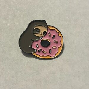 NWOT Sloth With A Donut Enamel Pin.